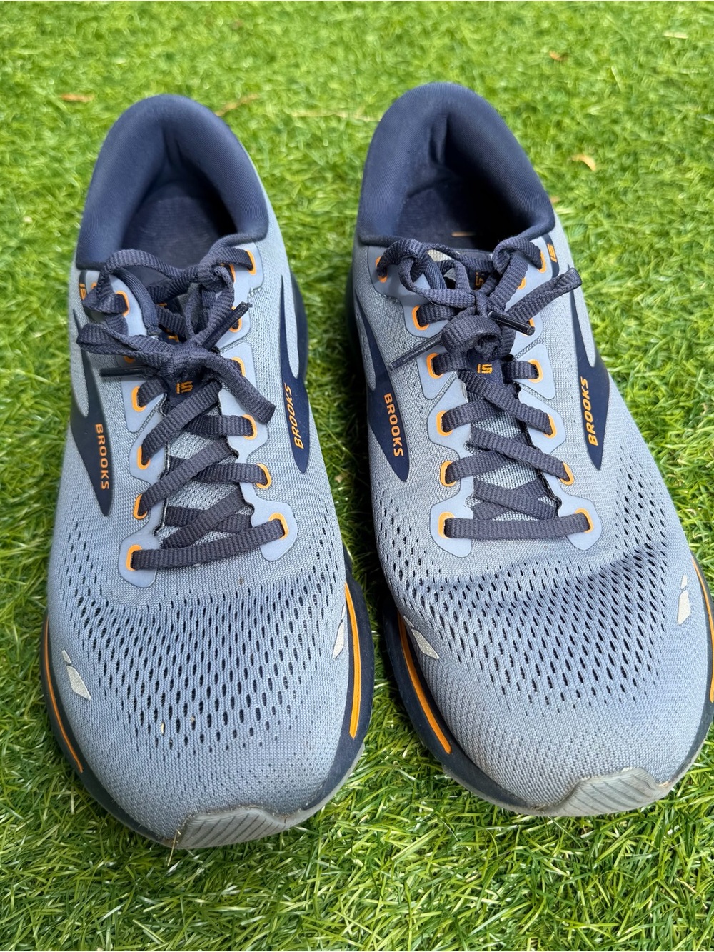 Brooks ghost 15Running Shoes in Light Gray with Navy and Orange Accents
